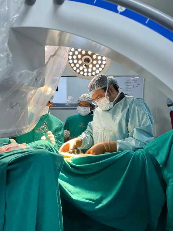 Dr. Kumar Vishal and team operating under OT lights at Medifirst Hospital